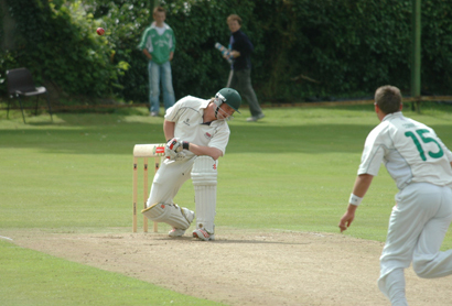 Waringstown's James Hall evades a Peter Connell bouncer