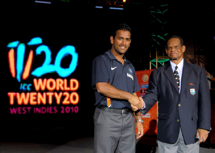 Indian cricket captain, Mahendra Singh Dhoni (left), and West Indies Cricket Board (WICB) President, Dr. Julian R. Hunte, celebrate the unveiling of the ICC WT20 West Indies 2010 logo at the Ticket Launch.
